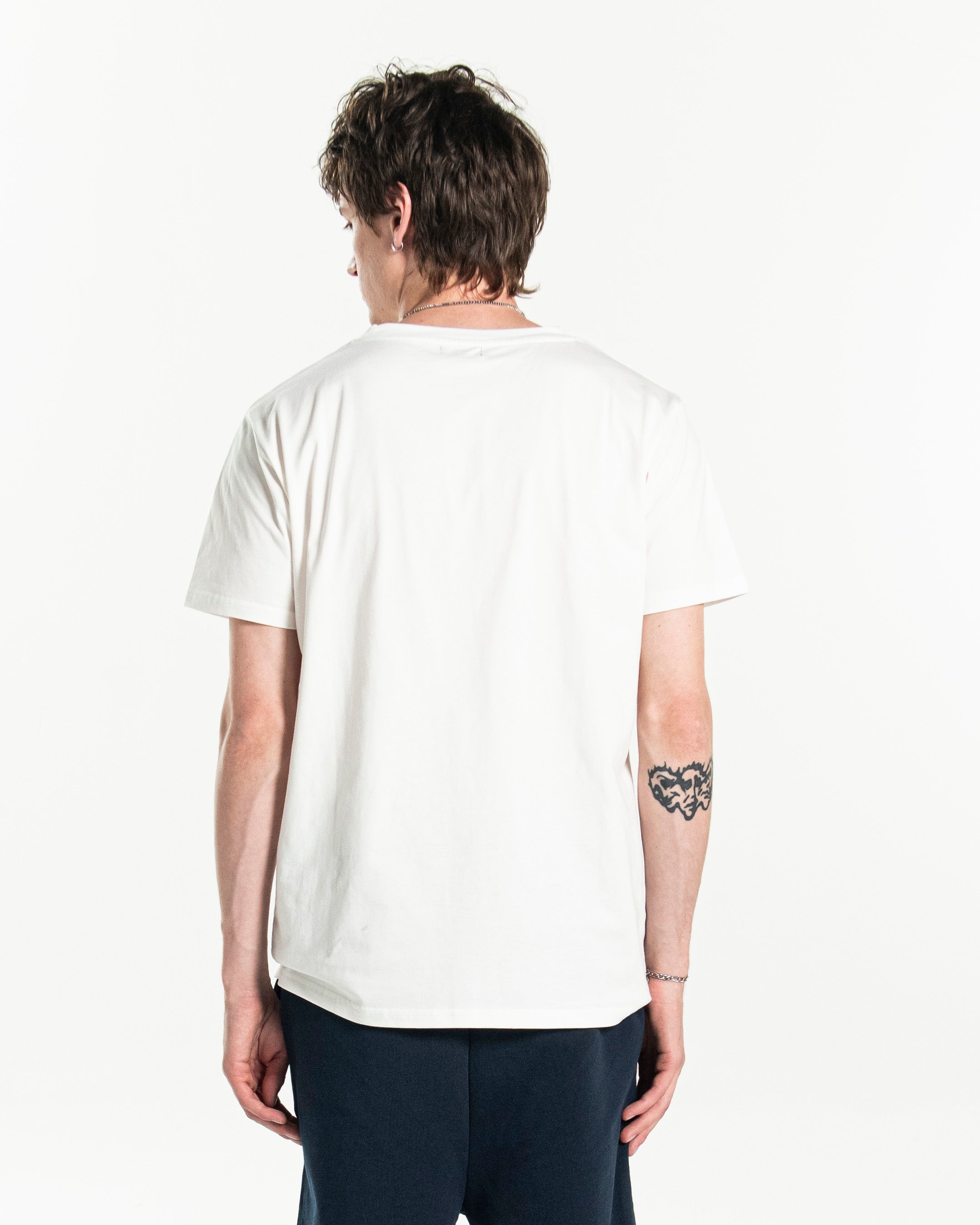 PSTVNRG T-Shirt in white, back view