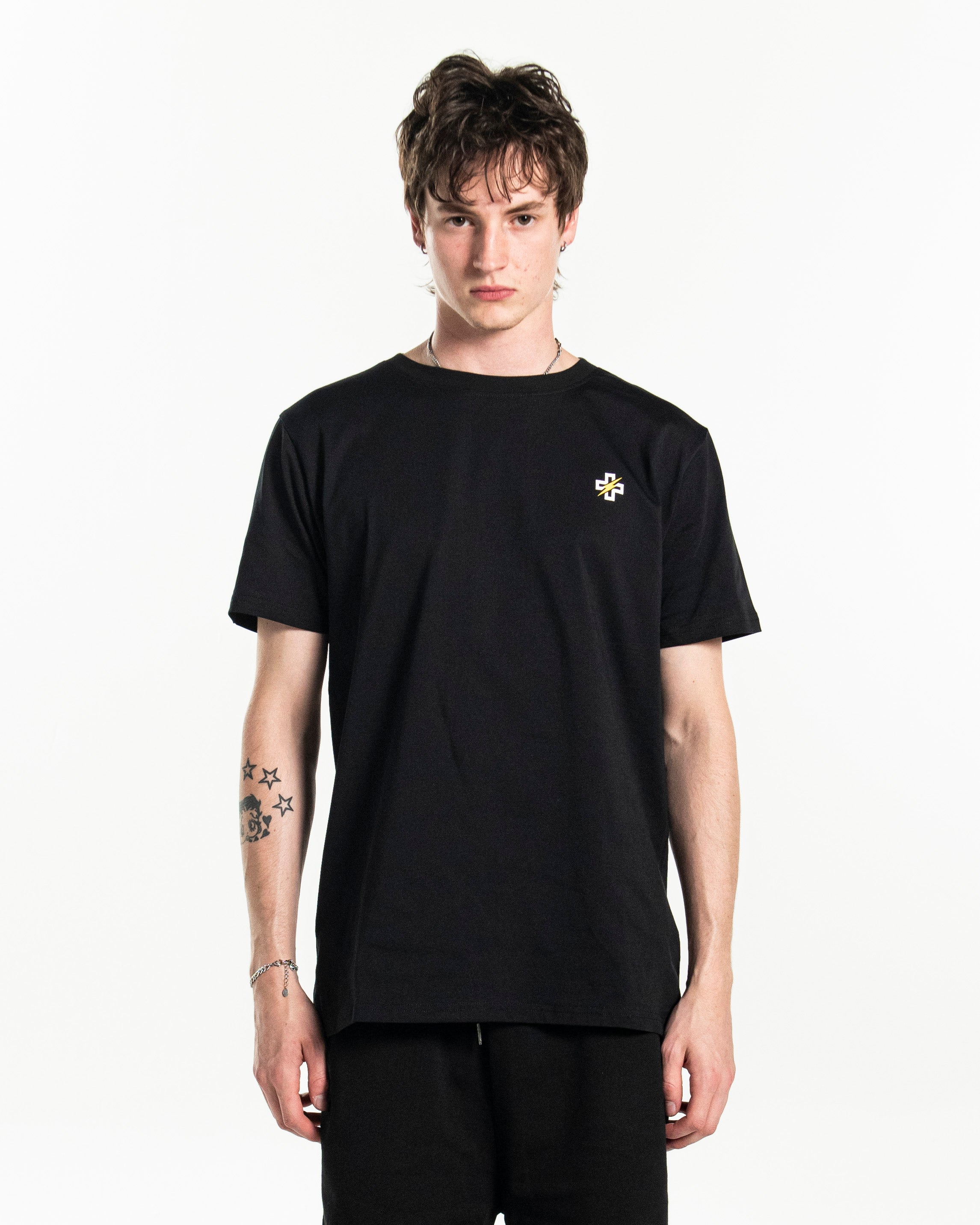 PSTVNRG T-Shirt in black, half body view