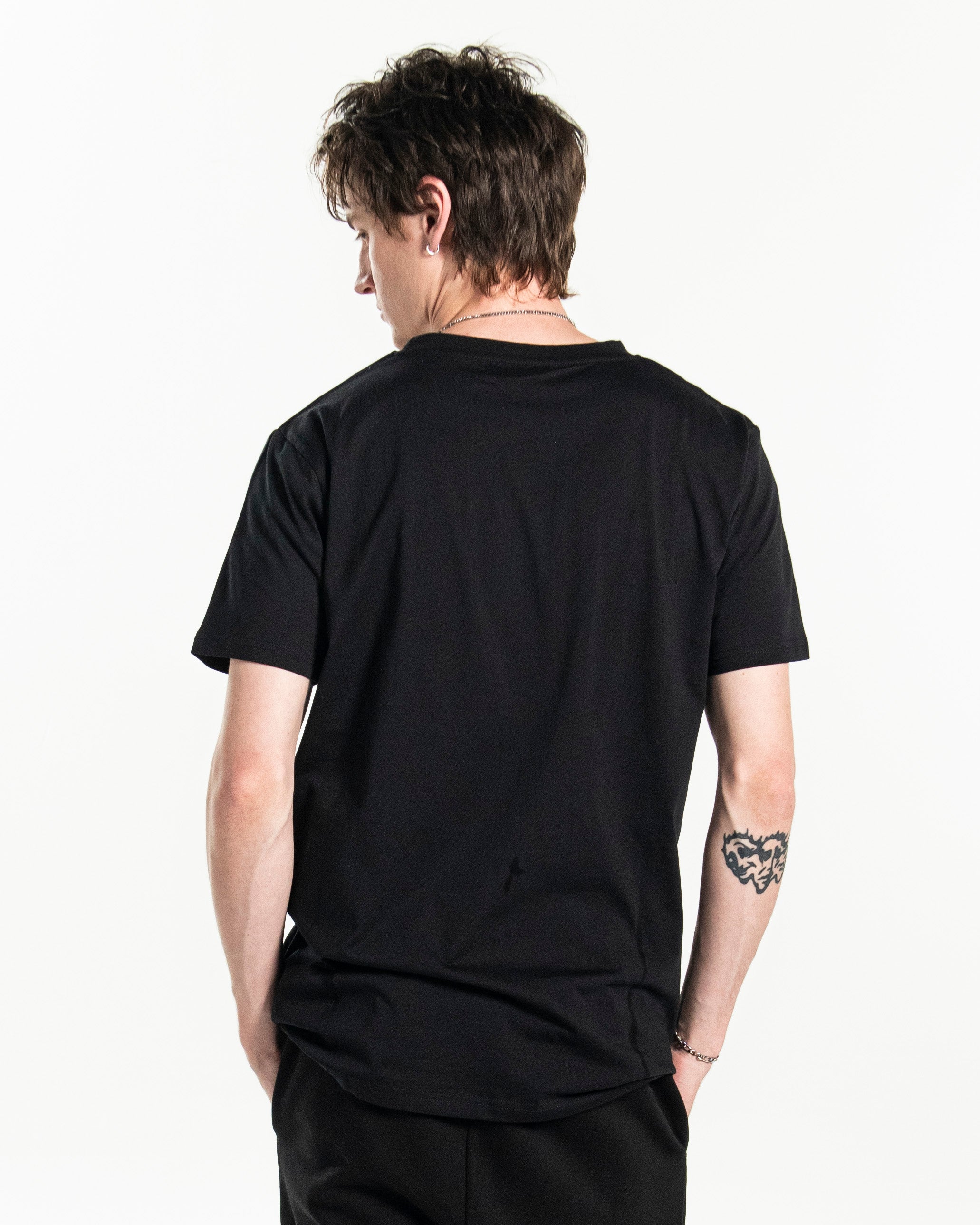 PSTVNRG T-Shirt in black, back view